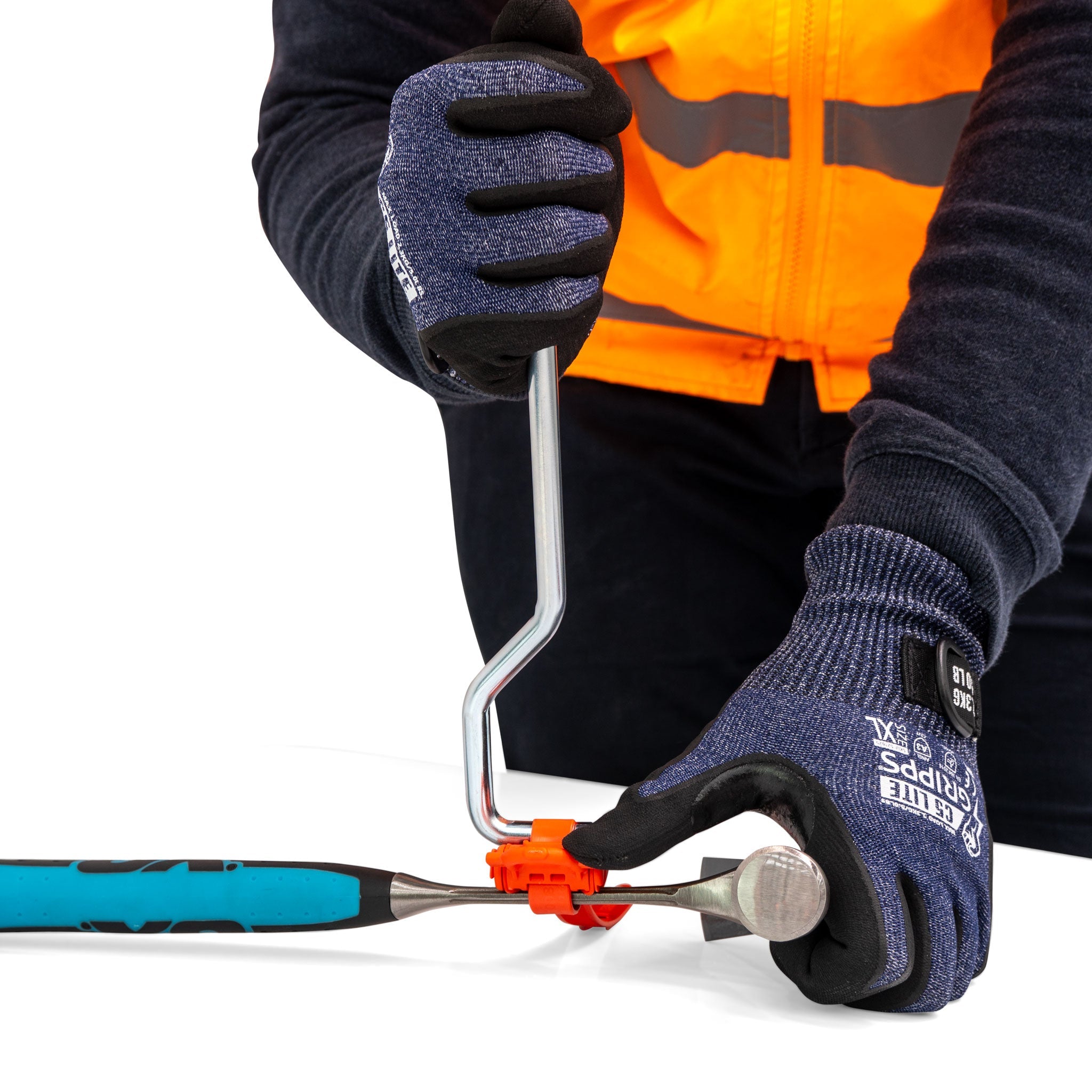Person using a GRIPPS GrippTie Tool, applying to a hammer whilst wearing GRIPPS S21626 gloves.